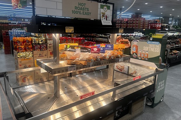 roast chicken supermarket display coles woolworths