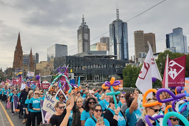 A sea of colour lined Melbourne's CBD streets today. (Kieran Jones)