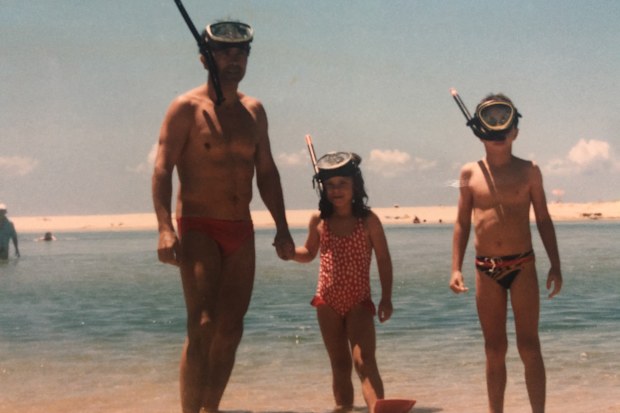 Suzanne with dad Roger and her brother.