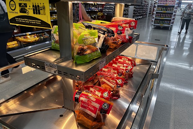 coles roast chickens display