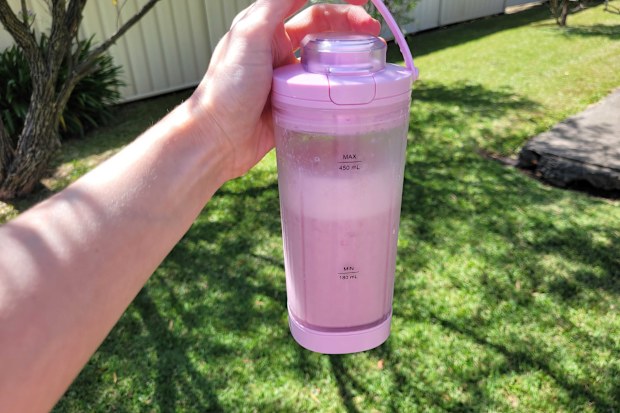 Kmart USB portable smoothie maker filled with strawberry smoothie