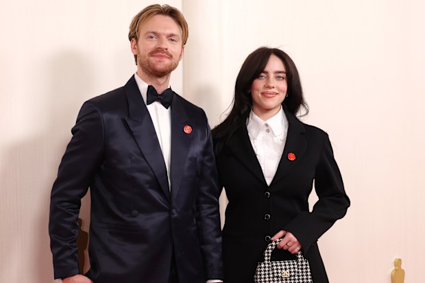 HOLLYWOOD, CALIFORNIA - MARCH 10: Billie Eilish and Finneas O'Connell attend the 96th Annual Academy Awards on March 10, 2024 in Hollywood, California. (Photo by JC Olivera/Getty Images)