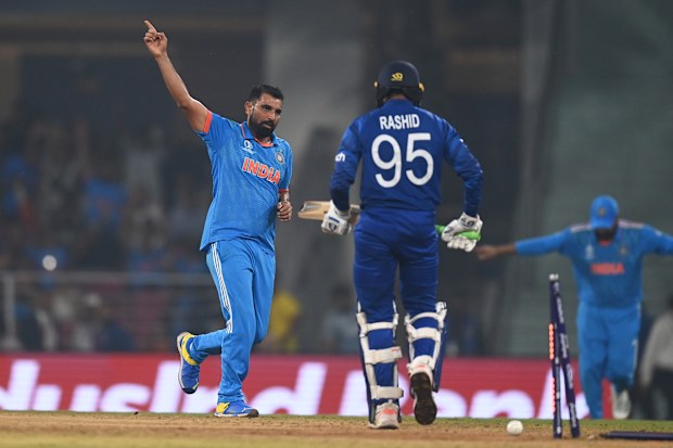  Mohammed Shami of India celebrates the wicket of Adil Rashid of England.