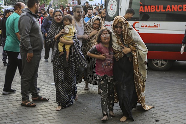 Injured Palestinians arrive to al-Shifa Hospital