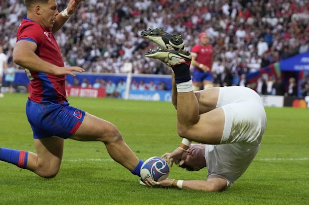 England's Henry Arundell scores one of his five tries during the Rugby World Cup against Chile.