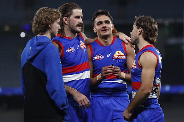 MELBOURNE, AUSTRALIA - JULY 15: Josh Bruce and Jamarra Ugle-Hagan of the Bulldogs ermbrace after the round 18 AFL match between the Western Bulldogs and the St Kilda Saints at Marvel Stadium on July 15, 2022 in Melbourne, Australia. (Photo by Darrian Traynor/Getty Images)