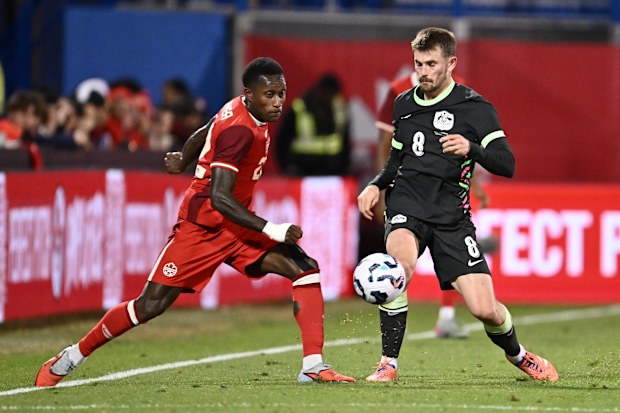 Australian Socceroos in action against Canada.