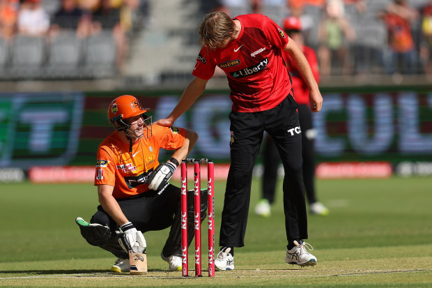 David Moody of the Renegades checks on Cameron Bancroft of the Scorchers after bowling a beamer during the Men's Big Bash League match between the Perth Scorchers and the Melbourne Renegades at Optus Stadium, on January 22, 2023, in Perth, Australia. (Photo by Paul Kane/Getty Images)