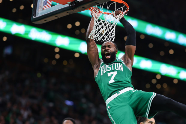BOSTON, MASSACHUSETTS - MAY 25: Jaylen Brown #7 of the Boston Celtics dunks the ball against the Miami Heat during the third quarter in game five of the Eastern Conference Finals at TD Garden on May 25, 2023 in Boston, Massachusetts. NOTE TO USER: User expressly acknowledges and agrees that, by downloading and or using this photograph, User is consenting to the terms and conditions of the Getty Images License Agreement. (Photo by Maddie Meyer/Getty Images)