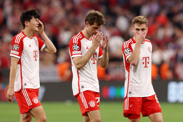 (From left) Kim Min-Jae, Thomas Mueller, and Joshua Kimmich of Bayern Munich react at full-time following the team's draw in the UEFA Champions League semi-final first leg match against Real Madrid.