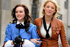 Leighton Meester as Blair Waldorf and Blake Lively as Serena van der Woodsen in Gossip Girl.