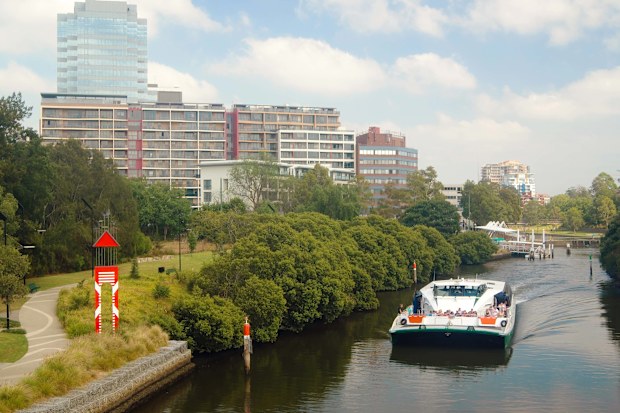 A Rivercat Ferry cruises along the Parramatta River in Sydney.