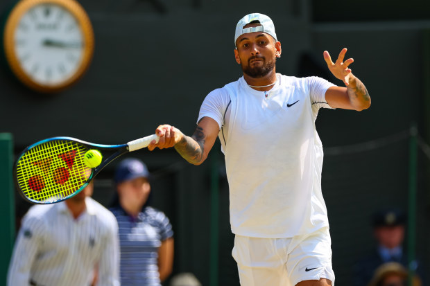 Nick Kyrgios of Australia hits a forehand against Novak Djokovic of Serbia during day fourteen of The Championships Wimbledon 2022 at All England Lawn Tennis and Croquet Club on July 10, 2022 in London, England. (Photo by Frey/TPN/Getty Images)