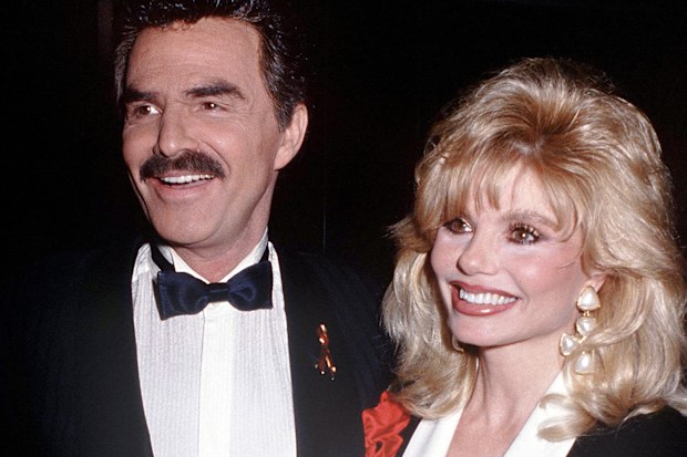 Burt Reynolds with actress Loni Anderson, then husband and wife, circa 1992.