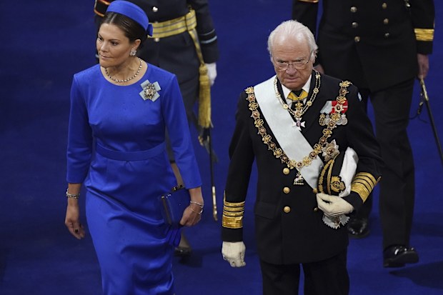 Sweden's King Carl XVI Gustaf and Crown Princess Victoria arrive for the coronation of Britain's King Charles III at Westminster Abbey, in London, Saturday May 6, 2023. (Andrew Matthews/Pool via AP)