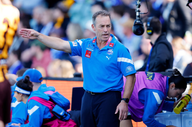 LAUNCESTON, AUSTRALIA - APRIL 01: Alastair Clarkson, Senior Coach of the Kangaroos coaches from the bench during the 2023 AFL Round 03 match between the Hawthorn Hawks and the North Melbourne Kangaroos at UTAS Stadium on April 1, 2023 in Launceston, Australia. (Photo by Dylan Burns/AFL Photos)