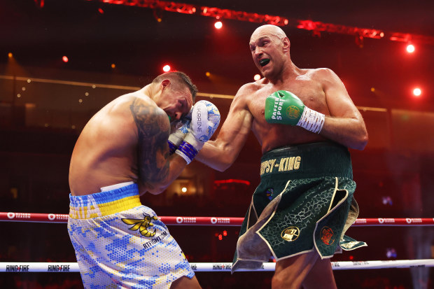 Tyson Fury punches Oleksandr Usyk during the IBF, WBA, WBC, WBO and Undisputed Heavyweight titles' fight between Tyson Fury and Oleksandr Usyk at Kingdom Arena on May 18, 2024 in Riyadh, Saudi Arabia. (Photo by Richard Pelham/Getty Images)