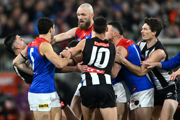 MELBOURNE, AUSTRALIA - SEPTEMBER 07: Demons players remonstrate with Brayden Maynard of the Magpies after Angus Brayshaw of the Demons was knocked out during the AFL First Qualifying Final match between Collingwood Magpies and Melbourne Demons at Melbourne Cricket Ground, on September 07, 2023, in Melbourne, Australia. (Photo by Quinn Rooney/Getty Images)