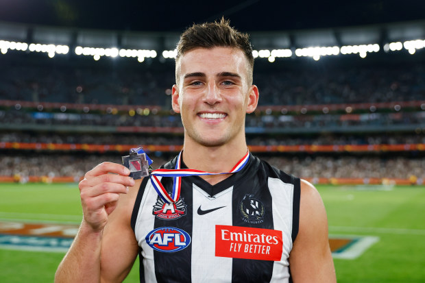 MELBOURNE, AUSTRALIA - APRIL 25: Nick Daicos of the Magpies poses for a photo after winning the Anzac medal during the 2023 AFL Round 06 match between the Collingwood Magpies and the Essendon Bombers at the Melbourne Cricket Ground on April 25, 2023 in Melbourne, Australia. (Photo by Dylan Burns/AFL Photos)