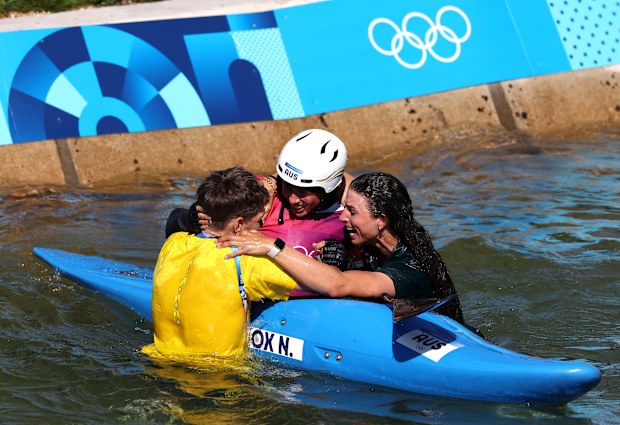 PARIS, FRANCE - AUGUST 05: Noemie Fox of Team Australia celebrates with her sister Jessica Fox after winning gold in the Canoe Slalom Women's Kayak Cross Final on day ten of the Olympic Games Paris 2024 at Vaires-Sur-Marne Nautical Stadium on August 05, 2024 in Paris, France. 