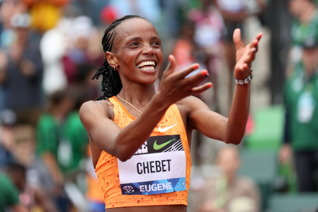 Beatrice Chebet celebrates breaking the women's 10,000m world record at Hayward Field.