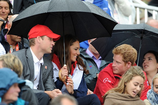 Prince William,  Duke of Cambridge, Catherine, Duchess of Cambridge and Prince Harry at the Show Jumping Eventing Equestrian on Day 4 of the London 2012 Olympic Games at Greenwich Park on July 31, 2012 in London, England.