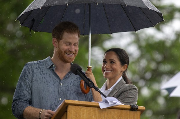 Prince Harry and Meghan, Duchess of Sussex attend a community picnic at Victoria Park in Dubbo, Australia, Wednesday, Oct. 17, 2018. 