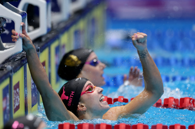 Regan Smith of the United States reacts after setting a world record in the Women's 100m backstroke.
