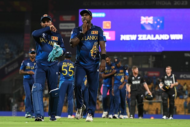 BANGALORE, INDIA - NOVEMBER 09: Kusal Mendis and Angelo Matthews of Sri Lanka make their way off following the ICC Men's Cricket World Cup India 2023 between New Zealand and Sri Lanka at M. Chinnaswamy Stadium on November 09, 2023 in Bangalore, India. (Photo by Matt Roberts-ICC/ICC via Getty Images)