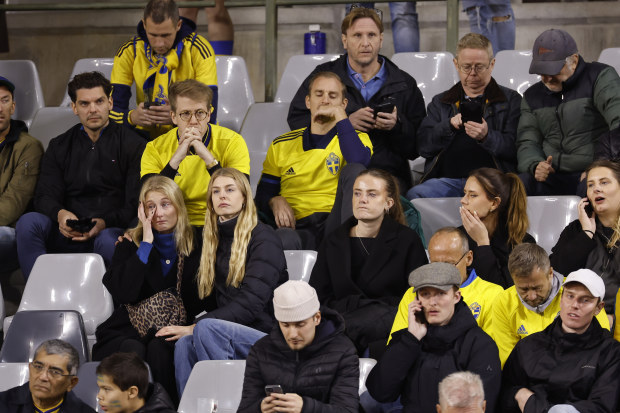 Sweden supporters sit in the stands at King Baudouin Stadium in Brussels.