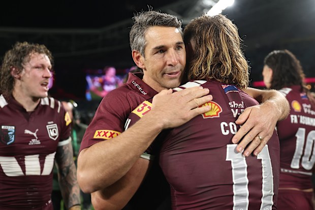 Reuben Cotter is embraced by Maroons coach Billy Slater.