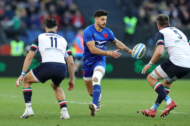 Romain Ntamack passes the ball during the Six Nations match against Italy at Stadio Olimpico.