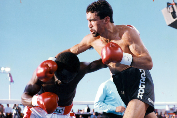 Jeff Fenech (R) lands a right punch against Azumah Nelson at the Princes Park Football Ground, on March 1, 1992 in Melbourne.