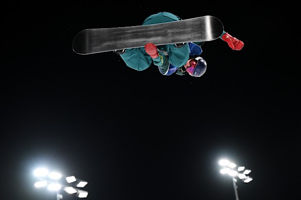 Scotty James is captured mid-air during halfpipe practice at Livigno Snow Park ahead of competition at Milano Cortina 2026.