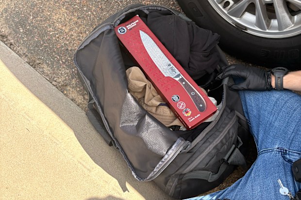 Police seized two flick knives, an extendable baton and electronic devices, which will be subject to forensic examination.  