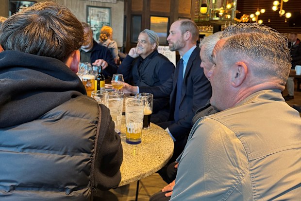The Prince of Wales meeting Aston Villa supporters in a Wetherspoons pub in the centre of Birmingham 