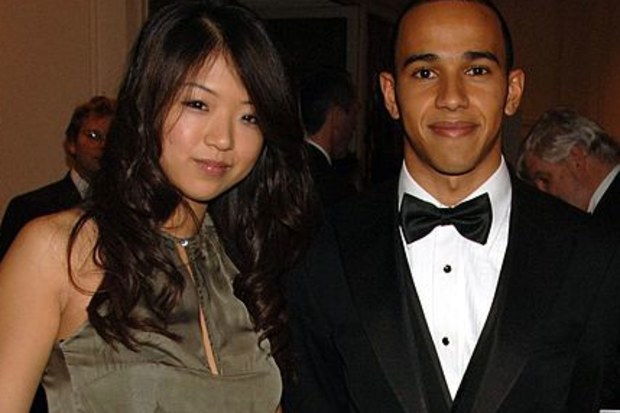 Lewis Hamilton poses with his girlfriend Jodia Ma (L) at the AutoSport Magazine awards at the Grovesnor House Hotel on December 3, 2006 in London, England.