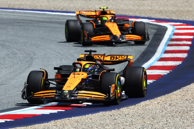 Oscar Piastri of Australia driving the (81) McLaren MCL38 Mercedes leads Lando Norris of Great Britain driving the (4) McLaren MCL38 Mercedes during the Sprint ahead of the F1 Grand Prix of Austria at Red Bull Ring on June 29, 2024 in Spielberg, Austria. (Photo by Clive Rose/Getty Images)