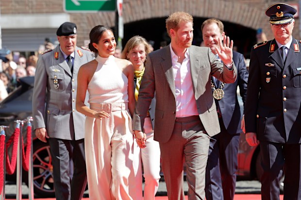 Prince Harry and Meghan, Duchess of Sussex arrive on the red carpet to be welcomed by the Mayor during the Invictus Games Dusseldorf 2023 - One Year To Go events on September 06, 2022 in Dusseldorf, Germany. (Photo by Mathis Wienand/Getty Images)