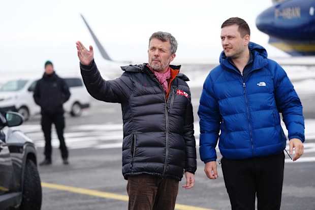 Denmark's King Frederik, left, and Greenland's Prime Minister, Jens-Frederik Nielsen, right, arrive in Nuuk, Greenland, Tuesday, April 29, 2025. (Ida Marie Odgaard/Ritzau Scanpix via AP)