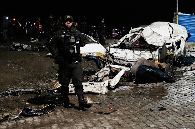 A cargo plane carrying money crashed near Bolivia's capital leaving at least 15 people dead.