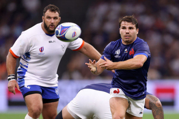 Antoine Dupont passes the ball in France's match against Namibia.