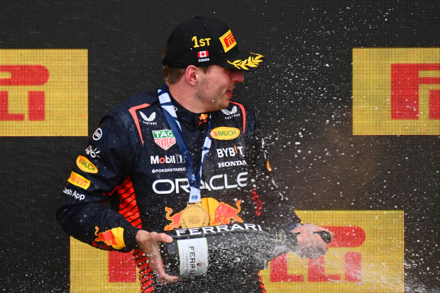 Max Verstappen of the Netherlands and Oracle Red Bull Racing celebrates on the podium during the F1 Grand Prix of Canada.