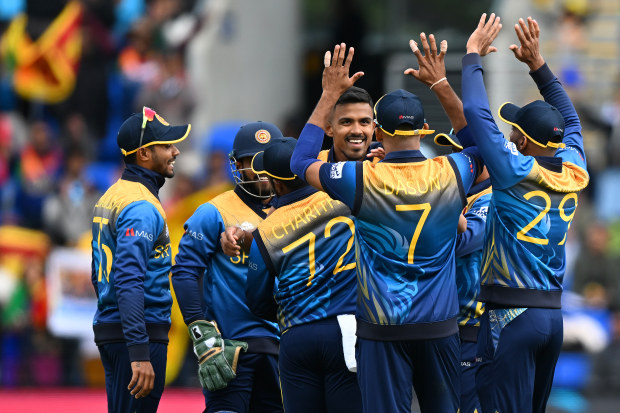 HOBART, AUSTRALIA - OCTOBER 23: Maheesh Theekshana of Sri Lanka celebrates the wicket of Lorcan Tucker of Ireland  during the ICC Men's T20 World Cup match between Sri Lanka and Ireland at Bellerive Oval on October 23, 2022 in Hobart, Australia. (Photo by Steve Bell - ICC/ICC via Getty Images)