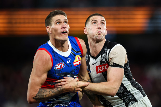 MELBOURNE, AUSTRALIA - JULY 07: Rory Lobb of the Bulldogs and Darcy Cameron of the Magpies compete in a ruck contest during the 2023 AFL Round 17 match between the Western Bulldogs and the Collingwood Magpies at Marvel Stadium on July 7, 2023 in Melbourne, Australia. (Photo by Dylan Burns/AFL Photos via Getty Images)
