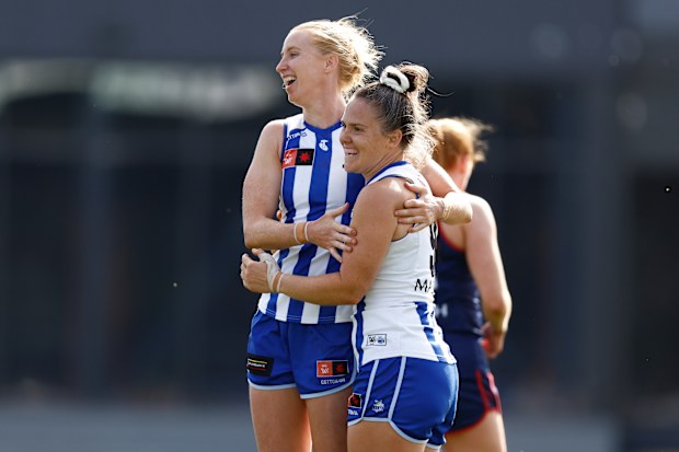MELBOURNE, AUSTRALIA - NOVEMBER 12: Kate Shierlaw (left) and Emma Kearney of the Kangaroos celebrate during the 2023 AFLW Second Qualifying Final match between The Melbourne Demons and The North Melbourne Tasmanian Kangaroos at IKON Park on November 12, 2023 in Melbourne, Australia. (Photo by Michael Willson/AFL Photos via Getty Images)