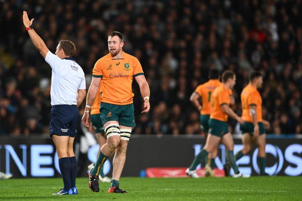 Jed Holloway of the Wallabies receives a yellow card from referee Andrew Brace in their match against the All Blacks at Eden Park.