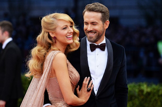 Actors Blake Lively (L) and Ryan Reynolds attend the "Charles James: Beyond Fashion" Costume Institute Gala at the Metropolitan Museum of Art on May 5, 2014 in New York City. 