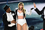 LONDON, ENGLAND - JUNE 23: (EDITORIAL USE ONLY. NO BOOK COVERS) EXCLUSIVE ACCESS. Taylor Swift is joined on stage by Travis Kelce (R), during "Taylor Swift | The Eras Tour" at Wembley Stadium on June 23, 2024 in London, England. (Photo by Gareth Cattermole/TAS24/Getty Images for TAS Rights Management )