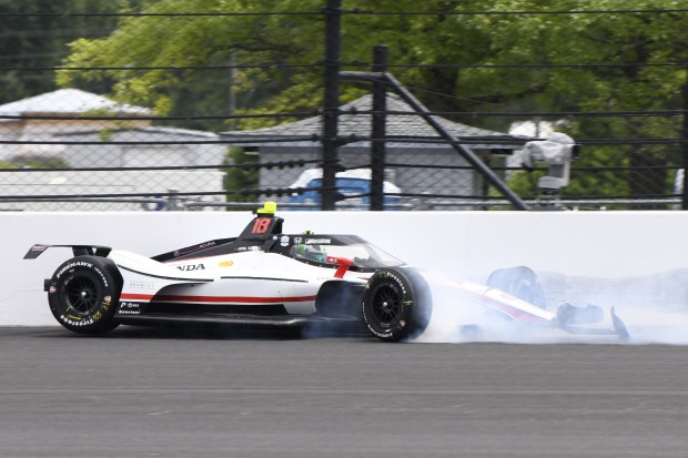 Nolan Siegel wrecks during practice for the Indianapolis 500.